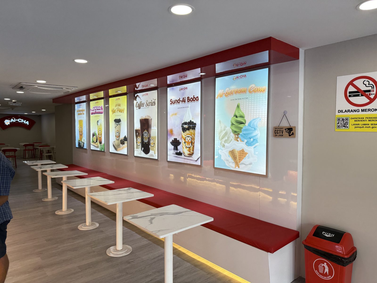 Ai-CHA illuminated menu lightboxes and seating