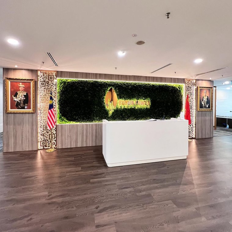 SPACE FIX DESIGN — office reception with moss wall