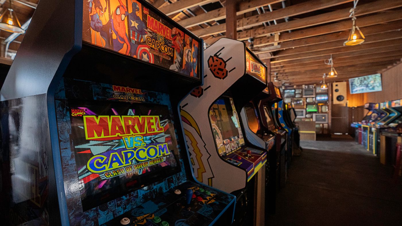 A row of arcade game machines in an entertainment centre, which needs a DBKL game entertainment licence
