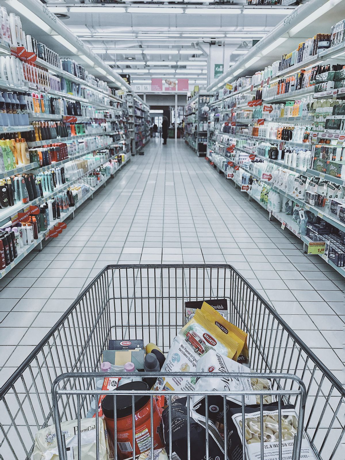 Branded consumer products lined up on supermarket shelves in Malaysia