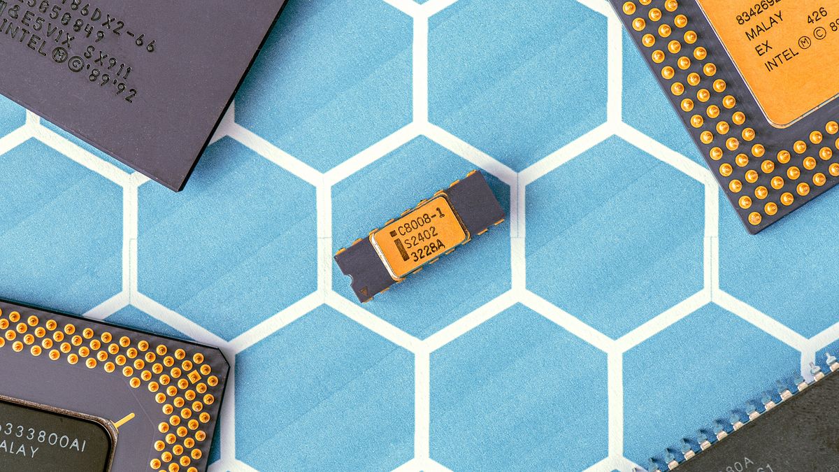 Close-up of integrated circuit packages and processor chips arranged on a patterned surface